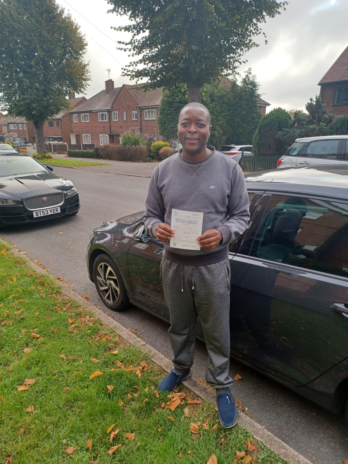 Happy student after passing their driving test